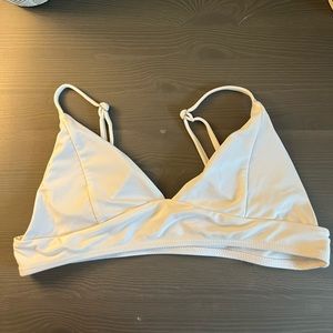 White top with white and blue striped bottoms